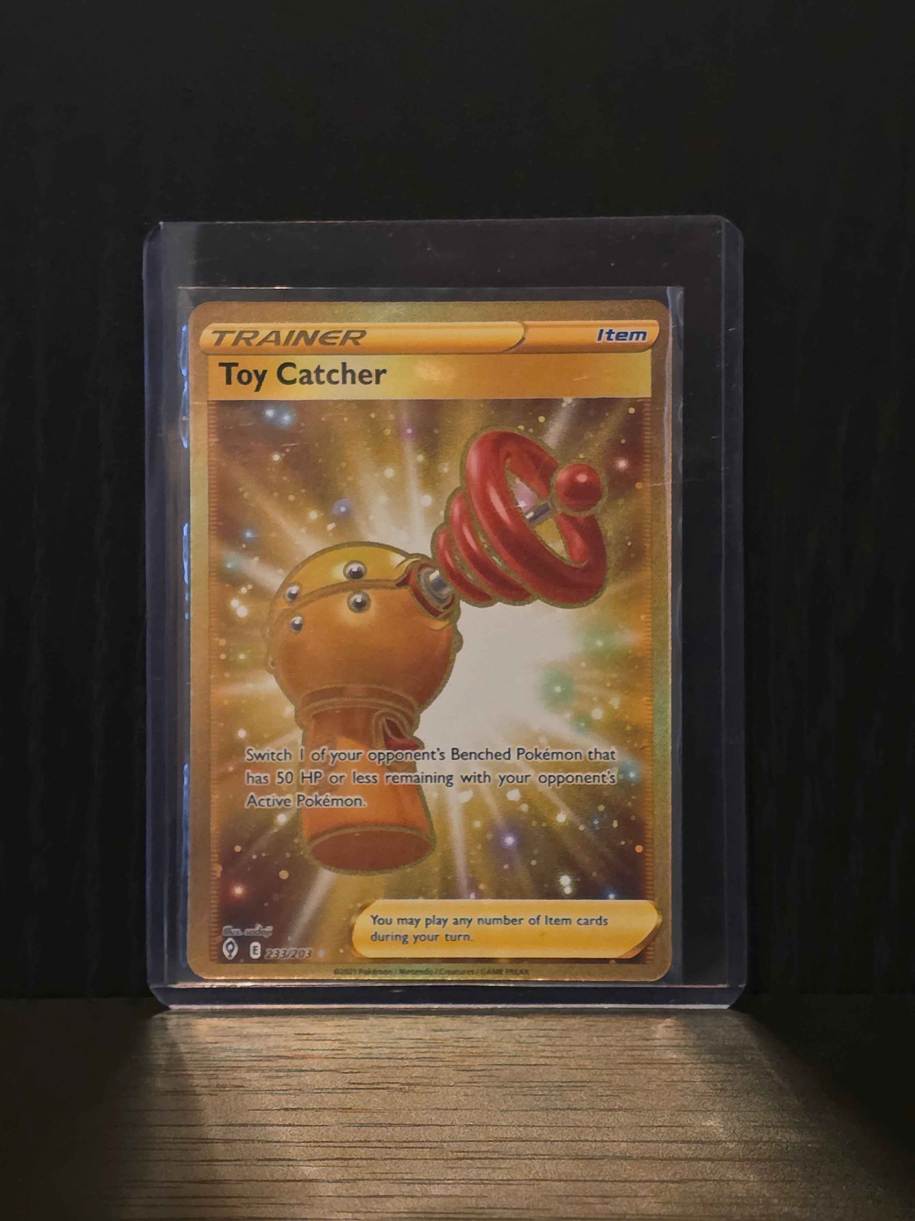 gold toy catcher pokemon card (Evolving Skies: 233/203) holofoil pattern or surface Disney Lorcana: Whispers in Style:Divine Convocation One Piece Sealed Booster Box